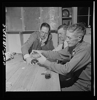 Moreno Valley, Colfax County, New Mexico. A poker party at George Turner's ranch. Sourced from the Library of Congress.