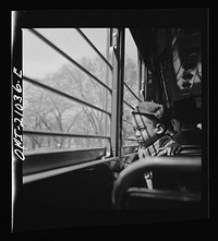 Washington, D.C. Child riding on a streetcar. Sourced from the Library of Congress.