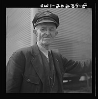 [Untitled photo, possibly related to: Baltimore, Maryland. Pop Ward, one of the oldest drivers working for the Associated Transport Company]. Sourced from the Library of Congress.