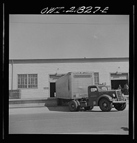 [Untitled photo, possibly related to: Gunter Field, Alabama. Trucks being loaded]. Sourced from the Library of Congress.