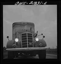 [Untitled photo, possibly related to: Truck from Montgomery, Alabama coming into Pensacola, Florida on U.S. Highway 29]. Sourced from the Library of Congress.