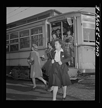 Baltimore, Maryland. Getting off a trolley at five p.m.. Sourced from the Library of Congress.