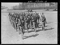 Camp Lejeune, New River, North Carolina. "Boots" (new recruits) learning to drill. Sourced from the Library of Congress.