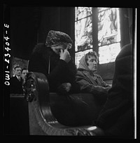 Buffalo, New York. Women factory workers attending mass at nine a.m. Sunday directly after working the third shift. Sourced from the Library of Congress.