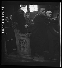 [Untitled photo, possibly related to: Buffalo, New York. Women factory workers attending mass at nine a.m. Sunday directly after working the third shift]. Sourced from the Library of Congress.