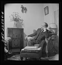 [Untitled photo, possibly related to: Philadelphia, Pennsylvania. Swedish-American foreman at the SKF roller bearing factory at home]. Sourced from the Library of Congress.