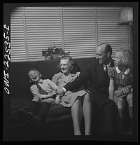 [Untitled photo, possibly related to: Philadelphia, Pennsylvania. Swedish-American vice president of the SKF roller bearing factory with his family. His wife is the daughter of the Swedish minister to the United Nations]. Sourced from the Library of Congress.