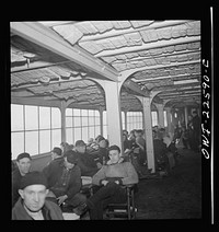 [Untitled photo, possibly related to: Baltimore, Maryland. Eighteen hundred workers are carried from the Bethlehem Fairfield shipyard to Baltimore on a former Wilson Line pleasure boat. The trip takes twenty minutes]. Sourced from the Library of Congress.