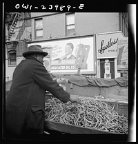 New York, New York. Street peddler in the Harlem section. Sourced from the Library of Congress.