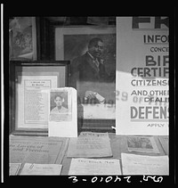 Signs in the windows of a Marcus Garvey club in the Harlem area. Sourced from the Library of Congress.