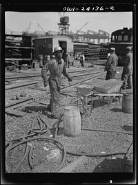 Baltimore, Maryland. Rivet heater engaged in the construction of the Liberty ship Frederick Douglass at the Bethlehem-Fairfield shipyards. Sourced from the Library of Congress.