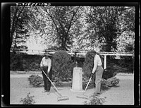 [Untitled photo, possibly related to: Manpower storage is so acute in Washington, D.C. that for the first time in history,  women are now employed as gardners in the rose garden of the Botanical Gardens--one of the beauty spots of the nation's capital]. Sourced from the Library of Congress.