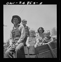 [Untitled photo, possibly related to: San Augustine, Texas. Farm family in town on Saturday morning]. Sourced from the Library of Congress.