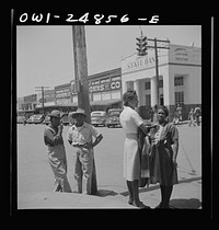 San Augustine, Texas. People on street corner on Saturday morning. Sourced from the Library of Congress.