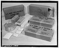 Chicago, Illinois. Subsistence research laboratory of the U.S. Army quartermaster depot. K ration is highly concentrated, and is used only in time of emergency and continuous combat when regular messing facilities are not available. Packed in three boxes for three meals, it weighs only 32.86 oz. and contains 3,726 calories. It is so packed that it will not be affected by temperatures up to 135-F or down to 20 below zero. Sourced from the Library of Congress.
