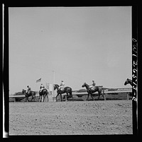 Pimlico racetrack, near Baltimore, Maryland. Parading to the post. Sourced from the Library of Congress.