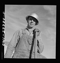[Untitled photo, possibly related to: Morenci, Arizona. Bulldozer operator at an open-pit copper mine of the Phelps Dodge mining corporation]. Sourced from the Library of Congress.
