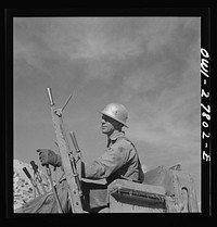 Morenci, Arizona. Bulldozer operator at an open-pit copper mine on the Phelps Dodge mining corporation. Sourced from the Library of Congress.