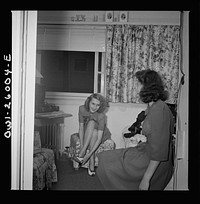 Arlington, Virginia. A room resident and her friend at Idaho Hall, Arlington Farms, a residence for women who work for the U.S. government for the duration of the war. Sourced from the Library of Congress.