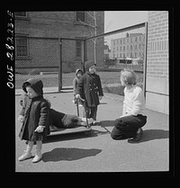 [Untitled photo, possibly related to: Buffalo, New York. Lakeview nursery school for children of working mothers, operated by the Board of Education at a tuition fee of three dollars weekly. Mother coming to pick up her child after work]. Sourced from the Library of Congress.