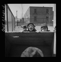 [Untitled photo, possibly related to: Buffalo, New York. Lakeview nursery school for children of working mothers, operated by the Board of Education at a tuition fee of three dollars weekly. Playing in the well-equipped yard]. Sourced from the Library of Congress.