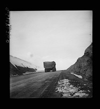 Somewhere on the Persian corridor. A United States Army truck convoy carrying supplies for the aid of Russia on a mountain road. Sourced from the Library of Congress.