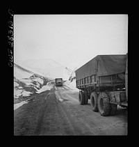 Somewhere on the Persian corridor. A United States Army truck convoy carrying supplies for the aid of Russia on a mountain road. Sourced from the Library of Congress.