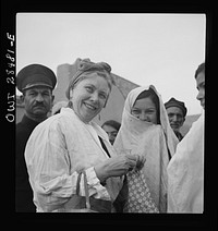 Teheran, Iran. Mrs. Louis Dreyfus, wife of the United States Minister to Iran, visiting native inhabitants. Sourced from the Library of Congress.