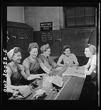 Pitcairn, Pennsylvania. Lunch hour in the women's locker at the yards of the Pennsylvania Railroad. Left to right: Bertha Carlotta, twenty-nine, a machinist testing axles; Anna Plecenik, twenty-four, a machinist's helper, working a drill press; Mary Stefanski, thirty-seven, a smith's helper; Cecelia Wadkowski, thirty-five, a machinist operating a turret lathe; and Susan Topolosky, thirty-two, a machinist's helper operating a radial dial press. Sourced from the Library of Congress.