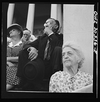 [Untitled photo, possibly related to: Washington, D.C. Listening to the U.S. Army band play at a free concert in front of the Capitol]. Sourced from the Library of Congress.