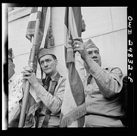 Arlington Cemetery, Arlington, Virginia. American Legion color bearer at the Memorial Day services in the amphitheater. Sourced from the Library of Congress.