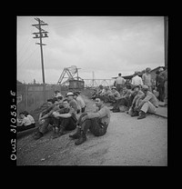 Beaumont, Texas. Shipyard workers waiting to go into work at the Pennsylvania shipyards. Sourced from the Library of Congress.