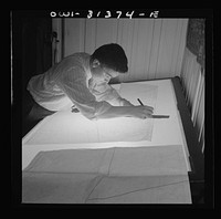 Washington, D.C. Preparing an advisory forecast at the U.S. Weather Bureau. Cutting a manuscript weather map into sections for speedy plotting. Sourced from the Library of Congress.