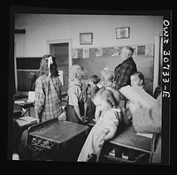 Buffalo Hill, Aroostook County, Maine. Congregational choir services held in one-room schoolhouse in isolated rural community. Sourced from the Library of Congress.