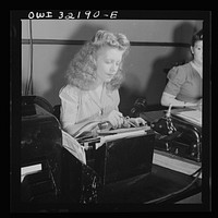 [Untitled photo, possibly related to: Washington, D.C. Jean Smith sending a Western Union telegram on the teleprinter to New York]. Sourced from the Library of Congress.
