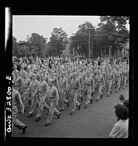 [Untitled photo, possibly related to: Oswego, New York. United Nations heroes marching behind the boy scouts carrying flags in the United Nations week parade]. Sourced from the Library of Congress.