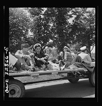 [Untitled photo, possibly related to: Oswego, New York. A hayride for the United Nations heroes and Oswego girls, during United Nations week]. Sourced from the Library of Congress.