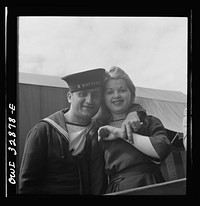[Untitled photo, possibly related to: Oswego, New York. Greek sailor and his friends at the carnival during United Nations week]. Sourced from the Library of Congress.