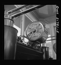 Detail of the controls in the pilot house of the towboat Ernest T. Weir going down the Ohio River to Cincinnati. Sourced from the Library of Congress.