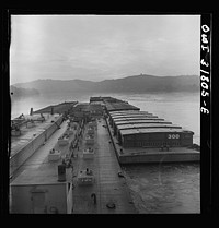 Barges in the tow of the towboat Ernest T. Weir going down the Ohio River to Cincinnati. Sourced from the Library of Congress.