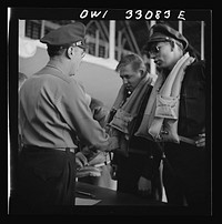 [Untitled photo, possibly related to: Bar Harbor, Maine. Civil Air Patrol base headquarters of coastal patrol no. 20. Routine check of "Mae West" life preservers]. Sourced from the Library of Congress.