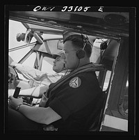 Bar Harbor, Maine. Civil Air Patrol base headquarters of coastal patrol no. 20. The pilot and an observer ready to take off. Sourced from the Library of Congress.