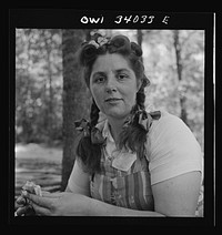 [Untitled photo, possibly related to: Turkey Pond, near Concord, New Hampshire. Women workers employed by a U.S. Department of Agriculture timber salvage sawmill. Mrs. Violet Storey, "takes away," is a farmer's wife with six children]. Sourced from the Library of Congress.