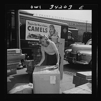 New Britain, Connecticut. Miss Ida Hicks, Lithuanian, twenty-eight years old, employed at the American Railway Express Company, sorting packages, weighting them, etc., earns seventy-nine and one-half cents an hour. She formerly worked in a defense plant. Sourced from the Library of Congress.