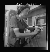 [Untitled photo, possibly related to: Louisville, Kentucky. Virginia Lively used to be a beauty operator. Today she works at a gas station]. Sourced from the Library of Congress.