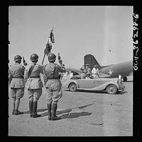 Tunis, Tunisia. General de Gaulle saluting the guard of honor drawn up at the airport to greet him on the occasion of his visit. Sourced from the Library of Congress.