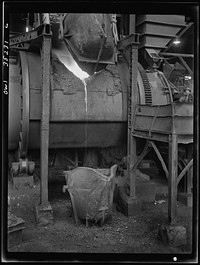 [Untitled photo, possibly related to: Garfield, Utah. Making molds of blister copper at the Garfield smelter of the American Smelting and Refining Ccompany]. Sourced from the Library of Congress.