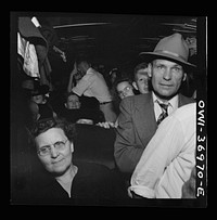 [Untitled photo, possibly related to: Passengers on a Greyhound bus going from Washington, D.C. to Pittsburgh, Pennsylvania]. Sourced from the Library of Congress.