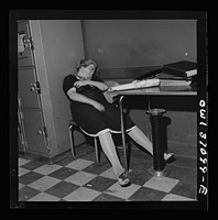 Pittsburgh, Pennsylvania. Waiting for a bus at the Greyhound bus terminal. Sourced from the Library of Congress.