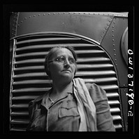 Pittsburgh, Pennsylvania. A charwoman who cleans buses at the Greyhound garage, a job formerly done by boys. Sourced from the Library of Congress.